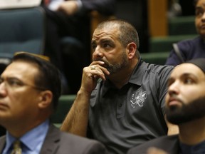 Mike Mata, president of the Dallas Police Association, listens during a meeting at Dallas City Hall in Dallas on Wednesday, April 24, 2019. The Dallas City Council has expanded the powers of the independent panel that oversees city police and hears complaints about officer misconduct.