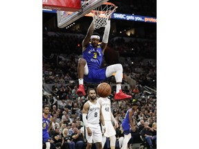 Denver Nuggets forward Torrey Craig (3) scores against the San Antonio Spurs during the first half of Game 4 of an NBA basketball playoff series in San Antonio, Saturday, April 20, 2019.