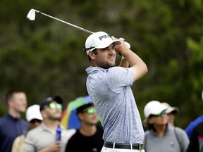 Corey Conners watches his drive on the third hole during the final round of the Texas Open golf tournament, Sunday, April 7, 2019, in San Antonio.