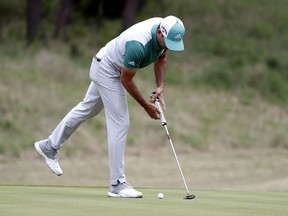 Sergio Garcia reaches to pick up his ball after he missed his second putt on No. 7 during quarterfinal play against Matt Kuchar at the Dell Technologies Match Play Championship golf tournament, Saturday, March 30, 2019, in Austin, Texas. Garcia had an 8-foot putt to win the hole and left it 4 inches short, a frustrating miss. Worse yet was what followed. Such a tap-in typically is conceded in the Dell Technologies Match Play, and the Spaniard walked up and casually rapped it left-handed. The ball spun around the cup, and he picked it up and walked off the green, assuming he remained 1 down through seven holes. One problem: Matt Kuchar never formally conceded the putt.