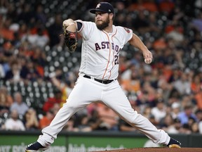 Houston Astros starting pitcher Wade Miley delivers during the first inning of a baseball game against the Minnesota Twins, Tuesday, April 23, 2019, in Houston.