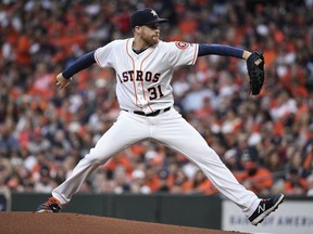 Houston Astros starting pitcher Collin McHugh delivers during the first inning of a baseball game against the Oakland Athletics, Friday, April 5, 2019, in Houston.