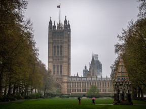 The Union Jack, flies above the Houses of Parliament in London.