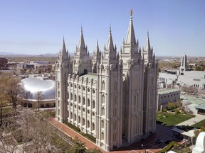 In this Thursday, April 18, 2019, photo, shows the Salt Lake Temple, in Salt Lake City. An iconic temple central to The Church of Jesus Christ of Latter-day Saints faith will close for four years to complete a major renovation, and officials are keeping a careful eye on construction plans after a devastating fire at Notre Dame cathedral in Paris.