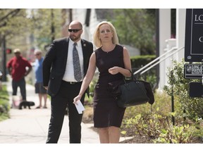 Homeland Security Secretary Kirstjen Nielsen talks outside her home in Alexandria, Va., on Monday, April 8, 2019. Nielsen says she continues to support the president's goal of securing the border in her first public remarks since her surprise resignation.