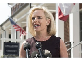 Homeland Security Secretary Kirstjen Nielsen talks outside her home in Alexandria, Va., on Monday, April 8, 2019. Nielsen says she continues to support the president's goal of securing the border in her first public remarks since her surprise resignation.