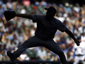Los Angeles Dodgers' Clayton Kershaw pitches during the third inning of a baseball game against the Milwaukee Brewers Sunday, April 21, 2019, in Milwaukee.