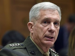 FILE - In this March 7, 2019 file photo, U.S. Africa Command Commander Gen. Thomas Waldhauser testifies before the House Armed Services Committee on Capitol Hill in Washington. U.S. Africa Command says new information shows a woman and a child were killed in a U.S. airstrike that was targeting al-Shabab insurgents in Somalia last year. The information released Friday contradicts military insistence last month no civilians had been killed in Somalia strikes since 2017, despite a human rights group's claims casualties had occurred.