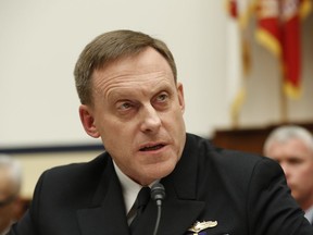 National Security Agency director Adm. Mike Rogers testifies on Capitol Hill in Washington in 2017.