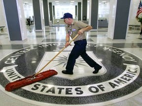FILE - In this March 3, 2005, file photo, a workman dusts the floor at the Central Intelligence Agency headquarters in Langley, Va. The American Civil Liberties Union has filed a lawsuit challenging a pre-publication review required for people who have had access to government secrets. The CIA says the pre-publication review is necessary to protect national security and protect former employees from legal liability. Timothy Barrett, a CIA spokesman, said the agency "does not comment on pending litigation."