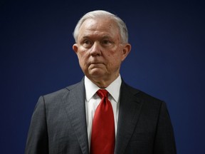 FILE - In this Oct. 15, 2018, file photo, Attorney General Jeff Sessions pauses during a news conference at the U.S. Attorney's Office for the District of Columbia in Washington.