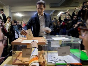 Citizens party leader Albert Rivera casts his vote for the general election in Hospitalet de Llobregat, Barcelona, Spain, Sunday, April 28, 2019. Galvanized by the Catalan crisis, Spain's far right is set to enter Parliament for the first time in decades while the Socialist government tries to cling on to power in Spain's third election in four years.