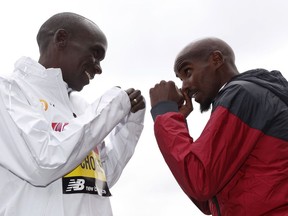 Britain's Mo Farah, right, and Kenya's Eliud Kipchoge pose for the media during a photo call for the London Marathon in London, Wednesday, April 24, 2019. Kipchoge and Farah are part of the Elite Men taking part in the 39th London Marathon which takes place Sunday April 28.