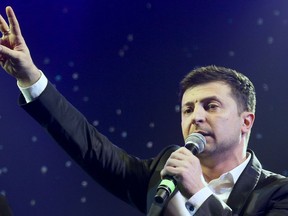 FILE In this file photo taken on Friday, March 29, 2019, Ukrainian comedian Volodymyr Zelenskiy hosts a comedy show at a concert hall in Brovary, Ukraine. Zelenskiy has no political experience but seems to have won Sunday's presidential vote, putting him in a strong position for the runoff election in three weeks' time.
