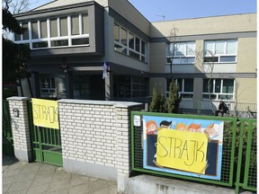 Banners, declaring the participation at the indefinite nationwide teachers' pay strike, displayed on the fence at the Primary School number 68 in Warsaw, Poland, on Monday, April 8, 2019. Majority of Poland's school and kindergarten teachers went on strike after talks about their payment with the government failed.