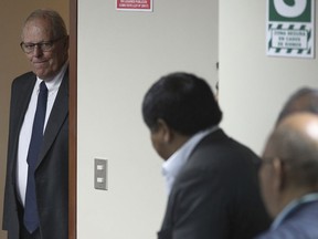 In this April 15, 2019 photo, Peru's former President Pedro Pablo Kuczynski returns to a court hearing to determine his release, in Lima, Peru. A judge in Peru ordered last week the detention for 10 days of the former leader as part of a money laundering probe into his consulting work for the company at the heart of Latin America's biggest graft scandal.