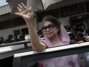 In this Thursday, June 2, 2016 file photo, former Bangladeshi Prime Minister Khaleda Zia waves as she leaves after a court appearance in Dhaka, Bangladesh. Bangladesh's opposition leader and former Prime Minister Khaleda Zia was being treated in a state hospital on Monday after being taken there from the centuries-old jail where she has been imprisoned since a corruption conviction, an official said.