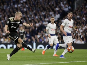 Ajax's Donny van de Beek scores his side's opening goal during the Champions League semifinal first leg soccer match between Tottenham Hotspur and Ajax at the Tottenham Hotspur stadium in London, Tuesday, April 30, 2019.