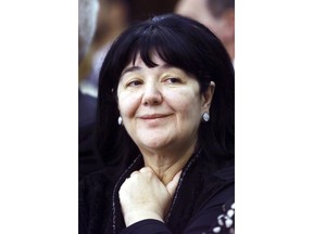 In this Nov. 28, 2000 file photo, Mirjana Markovic, the leader of the Yugoslav Left Alliance and the wife of former Yugoslav President Slobodan Milosevic, at the federal parliament session in Belgrade. Serbia's state television says that Mirjana Markovic, the widow of former strongman Slobodan Milosevic, has died in Russia. She was 76, it was reported on Sunday, April 14, 2019.