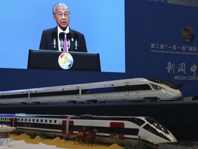 Malaysian Prime Minister Mahathir Mohamad is live broadcasted speaking at the Second Belt and Road Forum In Beijing on Friday, April 26, 2019. President Xi Jinping has promised to set high standards for China's Belt and Road infrastructure-building initiative, seeking to dispel complaints the many billion dollars in projects leave developing countries with too much debt. Countries including Malaysia and Thailand have canceled or scaled back projects while Ethiopia and others have renegotiated debt repayment.