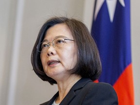 In this photo released by the Taiwan Presidential Office, Taiwanese President Tsai Ing-wen speaks during a military award ceremony at the Presidential office in Taipei, Taiwan on Monday, April 1, 2019. Taiwan said Monday its planes warned off Chinese military aircraft that crossed the center line in the Taiwan Strait, and called China's move a provocation that seeks to alter the status quo in the waterway dividing the island from mainland China. (Taiwan Presidential Office via AP)