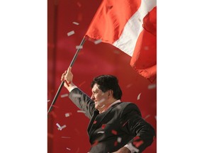 FILE - In this June 1, 2006 file photo, presidential candidate Alan García of the American Popular Revolutionary Alliance, or APRA, waves a Peruvian flag during his closing campaign rally in Lima, Peru. Current Peruvian President Martinez Vizcarra said Garcia, the 69-year-old former head of state died Wednesday, April 17, 2019, after undergoing emergency surgery in Lima. Garcia shot himself in the head early Wednesday as police came to detain him in connection with a corruption probe.