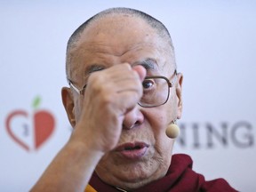 Tibetan spiritual leader the Dalai Lama speaks during a press conference after talking to an audience of educators, in New Delhi, India, Thursday, April 4, 2019. The Dalai Lama says he has been seeking a mutually acceptable solution to the Tibetan issue with China since 1974 but that Beijing considers him a "splittist."
