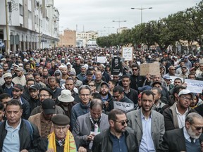 Thousands of Moroccans take part in a demonstration in Rabat, Morocco, Sunday, April 21, 2019. Protesters are condemning prison terms for the leader of the Hirak Rif protest movement against poverty and dozens of other activists.