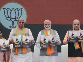 From Left, Indian Foreign Minister Suushma Swaraj, Home Minister Rajnath Singh, Indian Prime Minister Narendra Modi, Bharatiya Janata Party (BJP) president Amit Shah release BJP's manifesto for the upcoming general elections in New Delhi, India, Monday, April 8, 2019. India's general elections are scheduled to be held in seven phases starting from April 11. Votes will be counted on May 23.