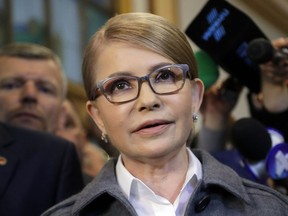 Former Ukrainian Prime Minister Yulia Tymoshenko, a candidate for the presidential elections, talks to the media after casting her ballot at a polling station during the presidential election in Kiev, Ukraine, Sunday, March 31, 2019. Ukrainians choose from among 39 candidates for a president they hope can guide the country of more than 42 million out of troubles including endemic corruption, a seemingly intractable conflict with Russia-backed separatists in the country's east and a struggling economy.