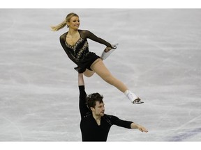 Canada's Kirsten Moore-Towers and Michael Marinaro perform their pairs free program routine during the ISU World Team Trophy Figure Skating competition Saturday, April 13, 2019 in Fukuoka, southwestern Japan.