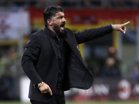 AC Milan coach Gennaro Gattuso gives directions to his players during the Italian Cup, second leg semifinal soccer match between AC Milan and Lazio, at the San Siro stadium, in Milan, Italy, Wednesday, April 24, 2019.