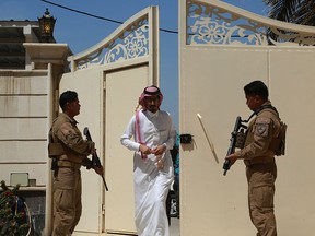 A member of the Saudi Arabia delegation arrives for the opening ceremony of their consulate in Baghdad, Iraq, Thursday, April 4, 2019. Saudi Arabia is opening four new consulates in Iraq and plans to invest one billion dollars for Saudi projects in Iraq.