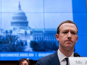 Facebook CEO Mark Zuckerberg pauses while testifying before a U.S. government hearing on Capitol Hill in Washington in a file photo from April 11, 2018.
