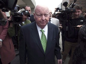 Sen. Mike Duffy leaves the courthouse after being acquitted on all charges Thursday, April 21, 2016 in Ottawa.