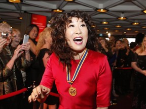 Actress Sandra Oh, recipient of the National Arts Centre Award, arrives on the red carpet at the Governor General's Performing Arts Awards at the National Arts Centre in Ottawa on April 26, 2019.