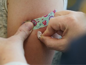 PROVO, UT - APRIL 29: A nurse prepares someone to receive a measles, mumps and rubella virus vaccine in Provo, Utah. The anti-vaccination has been growing in prominence recently, while the United States has seen its biggest outbreak of measles in decades.