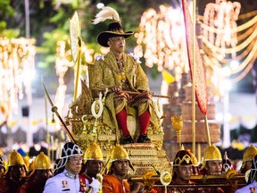 King Maha Vajiralongkorn takes part in the Royal Land Procession on the day following his coronation as King Rama X in Bangkok, Thailand.