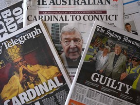 This photo illustration shows the front pages of Australia's major newspapers reporting the conviction of Cardinal George Pell in Sydney on February 27, 2019.