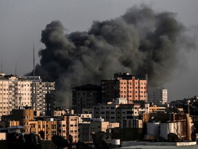 Smoke billows from a targeted neighbourhood in Gaza City during an Israeli airstrike on the Hamas-run Palestinian enclave.