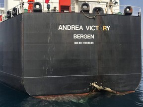 A picture taken on May 13, 2019 off the coast of the Gulf emirate of Fujairah shows Norwegian oil tanker Andrea Victory, one of the four tankers damaged in alleged "sabotage attacks" in the Gulf the previous day. - Saudi Arabia said two of its oil tankers were damaged in the mysterious "sabotage attacks" as tensions soared in a region already shaken by a standoff between the United States and Iran. (Photo by HANDOUT / Emirati National Media Council / AFP) / === RESTRICTED TO EDITORIAL USE - MANDATORY CREDIT "AFP PHOTO / l" - NO MARKETING NO ADVERTISING CAMPAIGNS - DISTRIBUTED AS A SERVICE TO CLIENTS ===