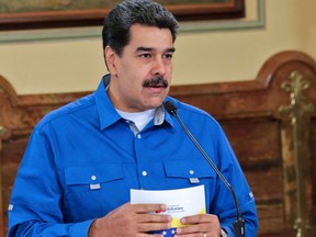 Handout picture released by the Miraflores presidential palace press office showing Venezuela's President Nicolas Maduro during a meeting with members of his cabinet in Caracas on May 15, 2019.