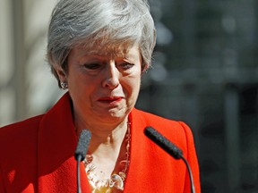 Britain's Prime Minister Theresa May reacts as she announces her resignation outside 10 Downing Street in London on May 24, 2019.
