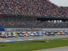 Austin Dillon (3) leads the pack to start a NASCAR Cup Series auto race at Talladega Superspeedway, Sunday, April 28, 2019, in Talladega, Ala.
