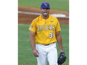 LSU pitcher Clay Moffitt reacts after a strikeout during the second inning of the Southeastern Conference tournament NCAA college baseball game against Mississippi State, Friday, May 24, 2019, in Hoover, Ala.