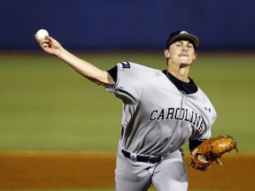 South Carolina's Cam Tringali throws a pitch to an LSU batter during the first inning of the Southeastern Conference tournament NCAA college baseball game Tuesday, May 21, 2019, in Birmingham, Ala.