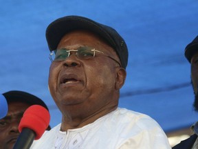 FILE - In this file photo taken on, Wednesday, July 31, 2016, Congo opposition leader Etienne Tshisekedi speaks during a political rally in Kinshasa, Congo. The body of longtime Congolese opposition leader Etienne Tshisekedi is headed home more than two years after his death now that his son is president. Family members had accused the former government of Joseph Kabila of blocking a funeral for Tshisekedi because it feared demonstrations around the country's most popular opposition figure. His body has been in Belgium since his death in early 2017.