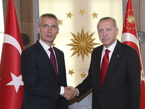 Turkey's President Recep Tayyip Erdogan, right, and NATO Secretary General Jens Stoltenberg shake hands before a meeting, in Ankara, Turkey, Monday, May 6, 2019. Stoltenberg is in Ankara for a working visit to Turkey in the framework of the 25th anniversary of the Mediterranean Dialogue. (Presidential Press Service via AP, Pool)