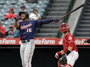 Minnesota Twins' Jonathan Schoop follows the path of his three-run home run against the Los Angeles Angels during the second inning of a baseball game Thursday, May 23, 2019, in Anaheim, Calif.