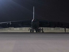 In this Thursday, May 9, 2019 photo released by the U.S. Air Force, a B-52H Stratofortress assigned to the 20th Expeditionary Bomb Squadron is parked on the ramp at Al Udeid Air Base, Qatar. The B-52 bombers ordered by the White House to deploy to the Persian Gulf to counter unspecified threats from Iran are beginning to arrive at a major American air base in Qatar.